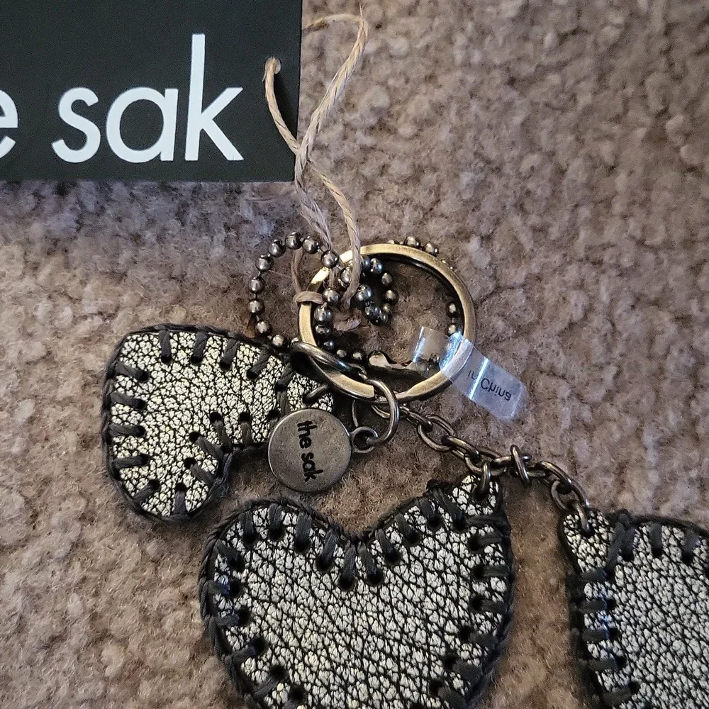 The sak leather triple dark silver hearts Keychain 💕 tagged gorgeous bag